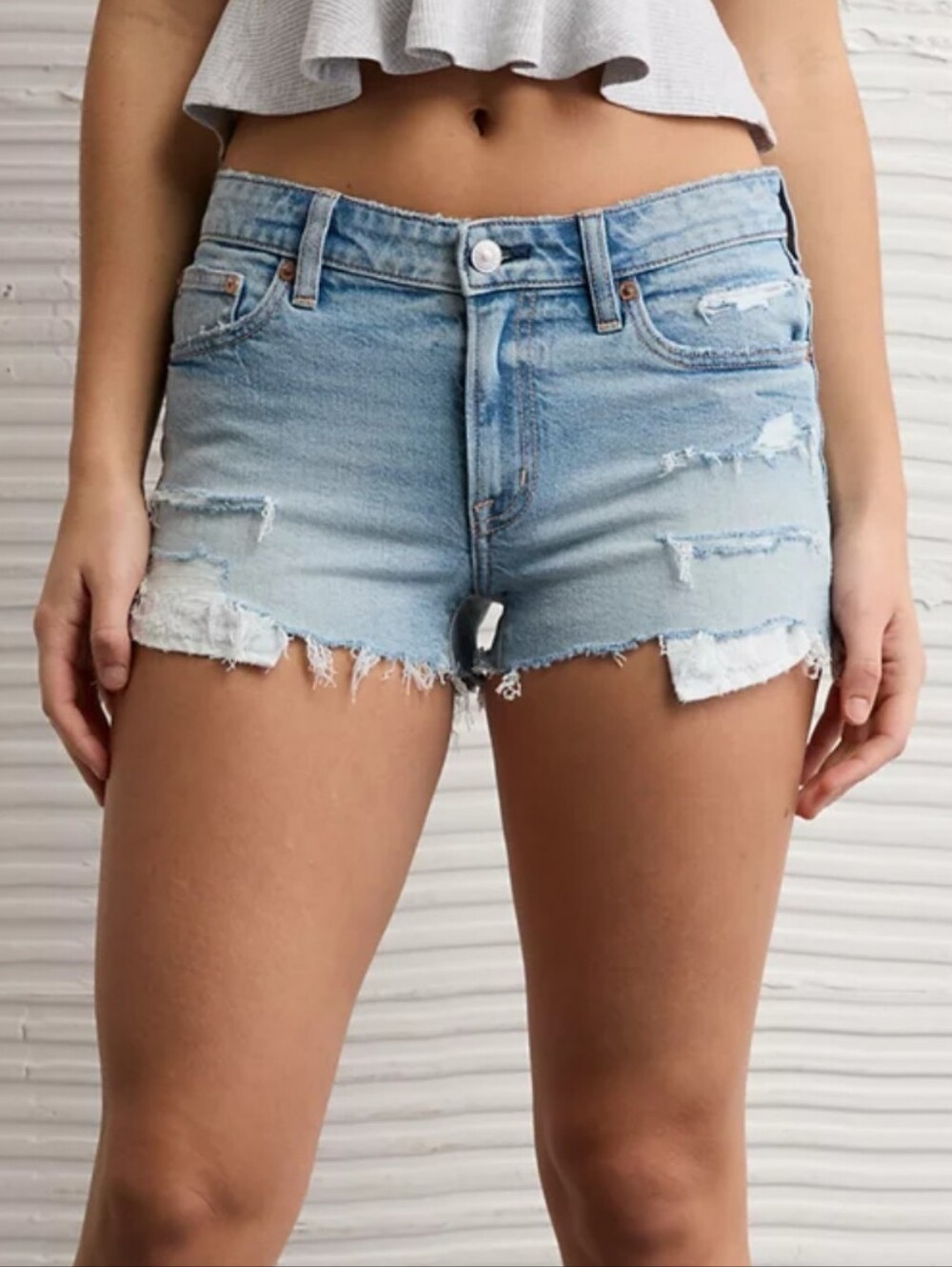 American Eagle Stretch Super Low Rise Perfect Shortie Distressted Light Wash